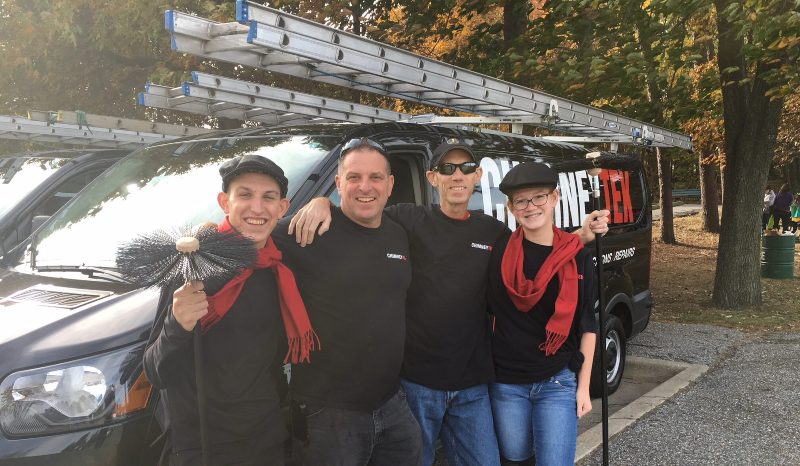Chimney tek staffs standing with happy smile at Maryland