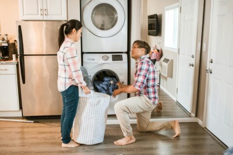 Women and Man doing laundry